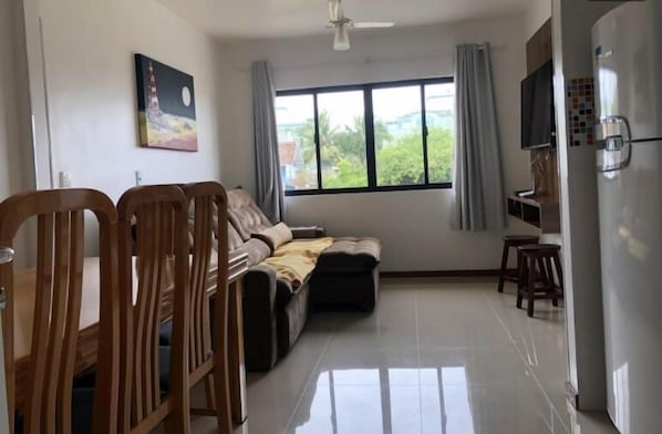 Comfort Apartment, Balcony, Sea View | Living area | 50-inch flat-screen TV with digital channels