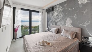 4 عدّة غرف نوم ومكواة/لوح كي وواي فاي وملاءات أسرّة