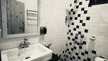 Deluxe Double Room, Balcony, City View | Bathroom | Shower, free toiletries, towels, soap