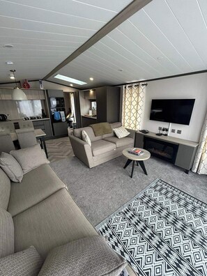 Cabaña | Zona de estar | Una chimenea