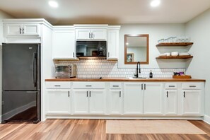 Fridge, microwave, coffee/tea maker, toaster