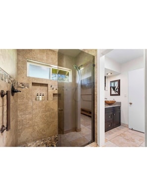 Shower, towels, soap, toilet paper
