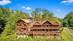 Exterior - Sleeps ~22, Heated Indoor Pool, Hot Tub, Game Room, outdoor fireplace, big deck (Sevierville)