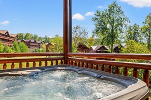 Outdoor spa tub - Sleeps ~22, Heated Indoor Pool, Hot Tub, Game Room, outdoor fireplace, big deck (Sevierville)