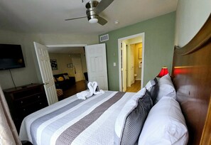 1 bedroom, desk, iron/ironing board, travel crib