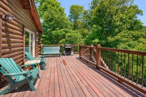 A wooden deck with outdoor seating and a barbecue grill. - Waccabuck | 17.5 Private Acres, Pool, Hot Tub (Logan)