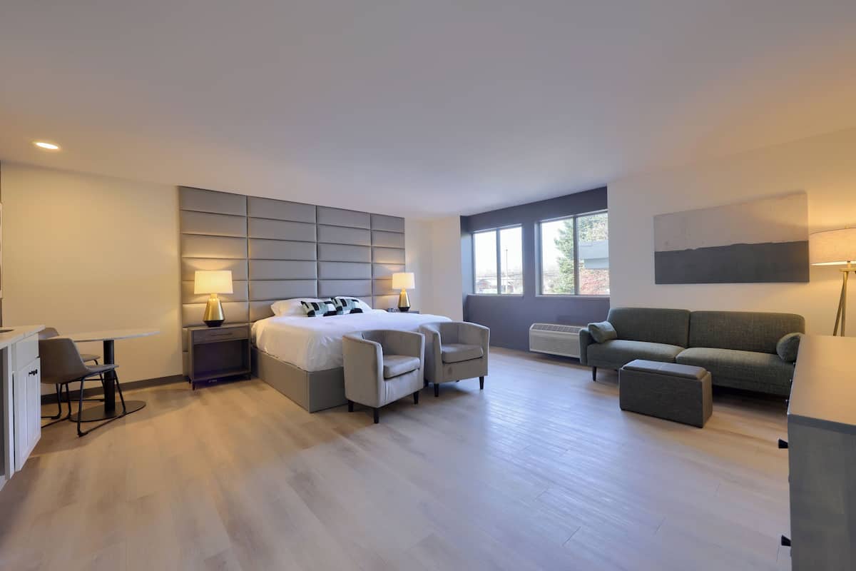 Superior Studio Suite, 1 King Bed, Kitchenette | Blackout drapes, iron/ironing board, free WiFi, bed sheets