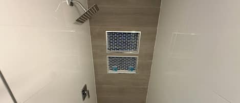 Shower, towels, soap, toilet paper