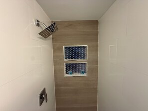 Shower, towels, soap, toilet paper