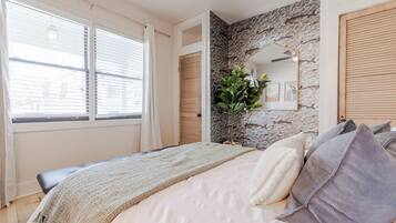 2 bedrooms, desk, iron/ironing board, travel crib