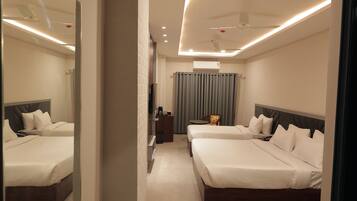 Nirvana Family Suite | Premium bedding, memory foam beds, free minibar items, desk