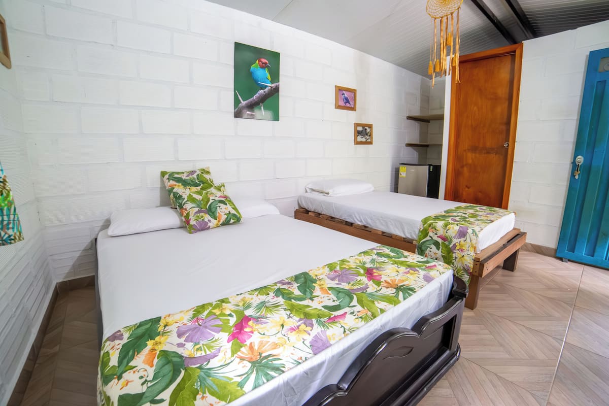 Basic-Doppel- oder -Zweibettzimmer, Gartenblick | 1 Schlafzimmer, kostenloses WLAN