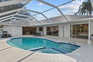 Outdoor pool - Riverside Retreat: 4BR/3BA with Private Dock and Boat Lift (Stuart)