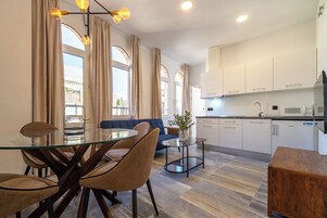 Family Apartment, City View | Living area | 35-inch Smart TV with satellite channels, Netflix, streaming services