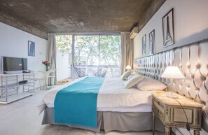 Superior Duplex, 1 Bedroom | Pillowtop beds, in-room safe, individually decorated, laptop workspace