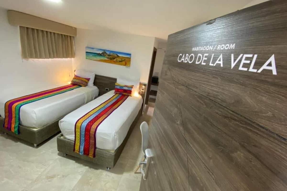 Standard Twin Room | In-room safe, desk, blackout drapes, iron/ironing board