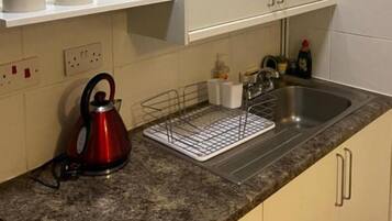 Deluxe Apartment | Private kitchen | Freezer