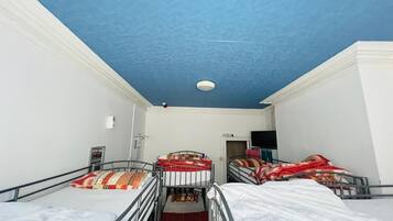 Standard Room, Multiple Beds, City View | In-room safe, desk, laptop workspace, iron/ironing board