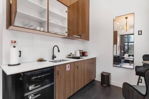 Fridge, microwave, stovetop, coffee/tea maker
