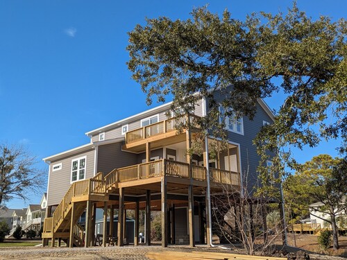 Outdoor living at its best with new construction, pet friendly and water views