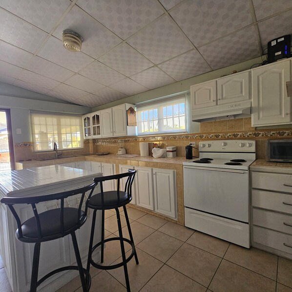 Microwave, oven, stovetop, coffee/tea maker