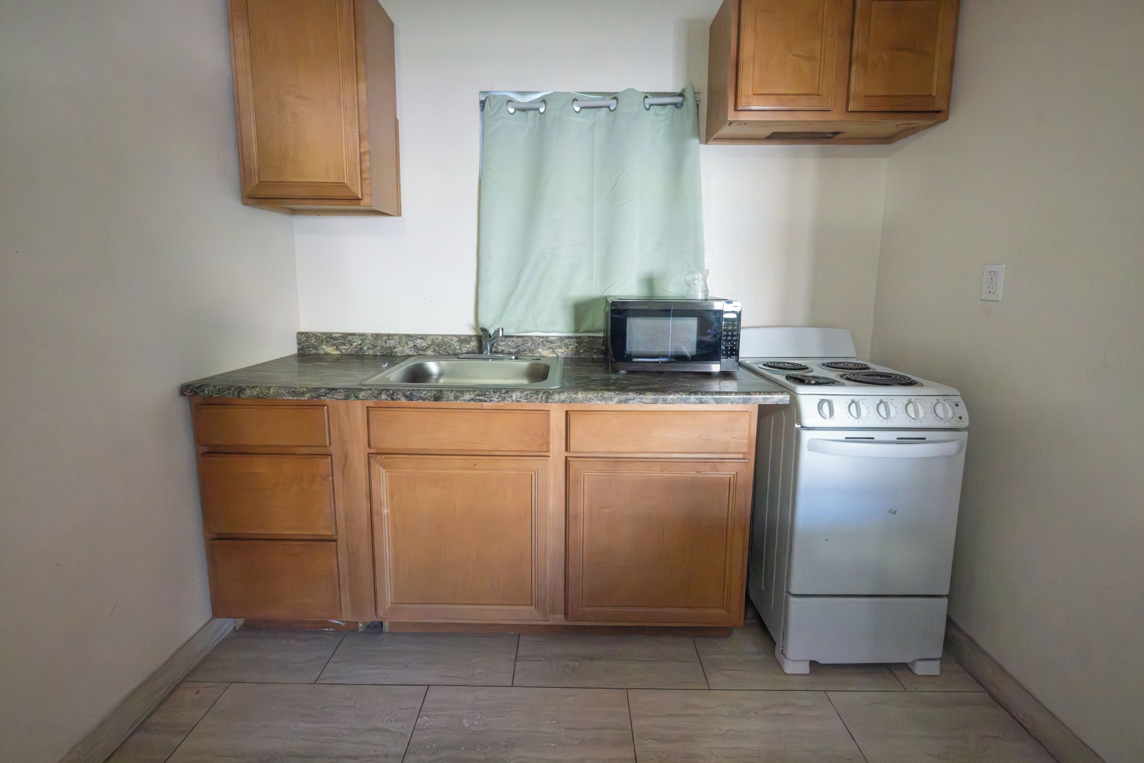 Room, 2 Queen Beds, Non Smoking, Kitchen | Private kitchenette | Mini-fridge, microwave, dining tables