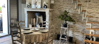 Charming stone house on the waterfront in a small family village 