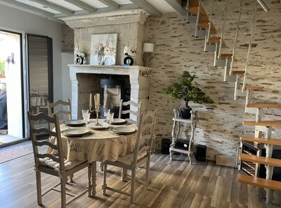 Charming stone house on the waterfront in a small family village