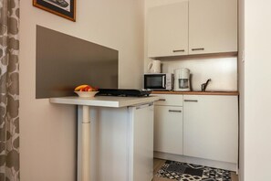 Fridge, microwave, high chair