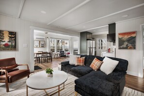 Smart TV, fireplace, books, stereo