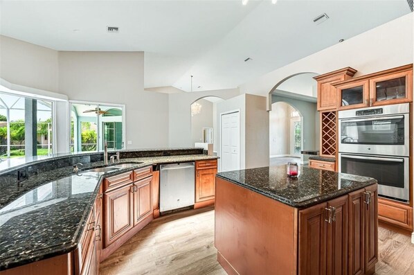 Fridge, microwave, oven, stovetop - Port Boujee: Spacious 5-bedroom house in Port Charlotte with Pool, AC, WiFi (Port Charlotte)