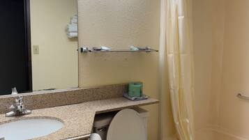Combined shower/bathtub, hair dryer, towels, soap