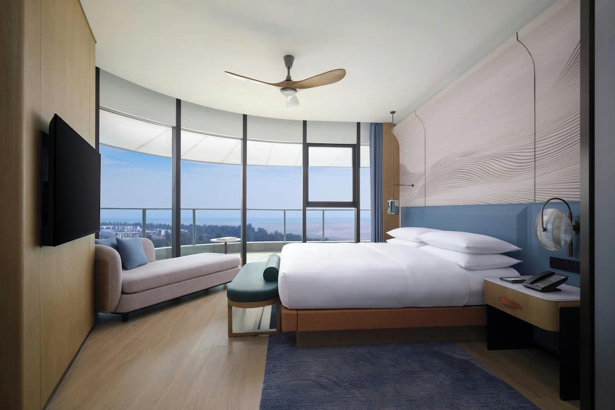 Suite Deluxe, 1 cama King size, balcón, vista al océano | Edredón, caja de seguridad en la habitación y decoración personalizada