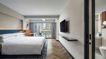 Deluxe Studio Suite, 1 King Bed, City View | Frette Italian sheets, premium bedding, down comforters, minibar