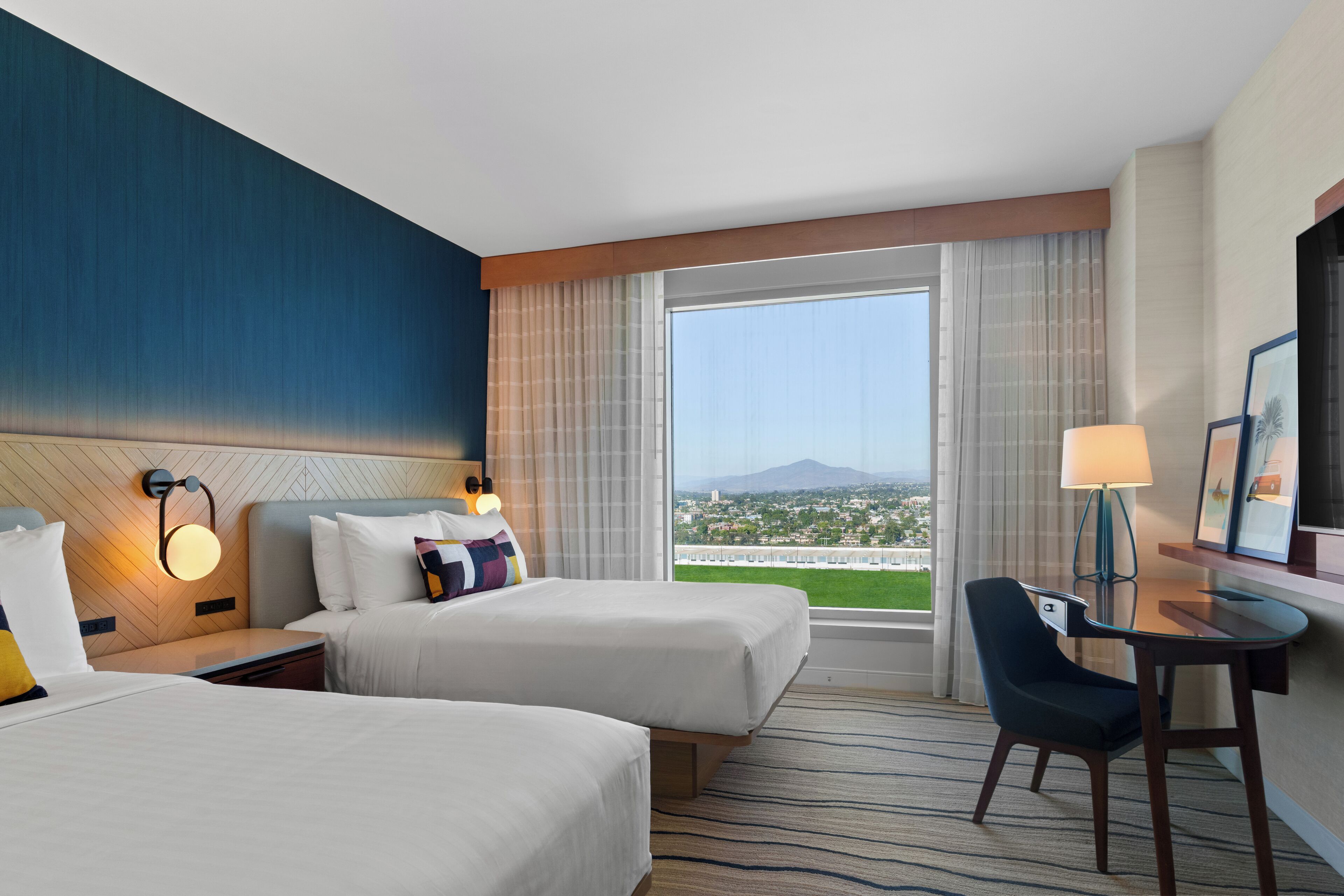 Premium bedding, desk, laptop workspace, bed sheets