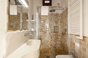 Shower, free toiletries, hair dryer, bidet