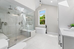 Shower, hair dryer, towels, soap