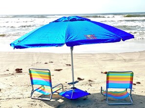 On the beach, sun-loungers, beach towels
