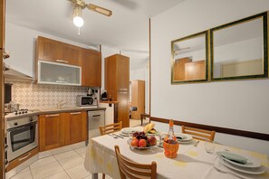 Fridge, stovetop, coffee/tea maker, toaster - Roby loft-Direct Lake Access/Beach, Gardone Riviera, Italy (Gardone Riviera)