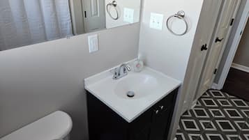 Hair dryer, towels, soap, toilet paper