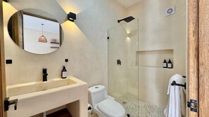 Deluxe Apartment, Balcony, Pool View | Bathroom | Shower, hair dryer, towels, soap