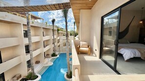 Deluxe Apartment, Balcony, Pool View | Terrace/patio