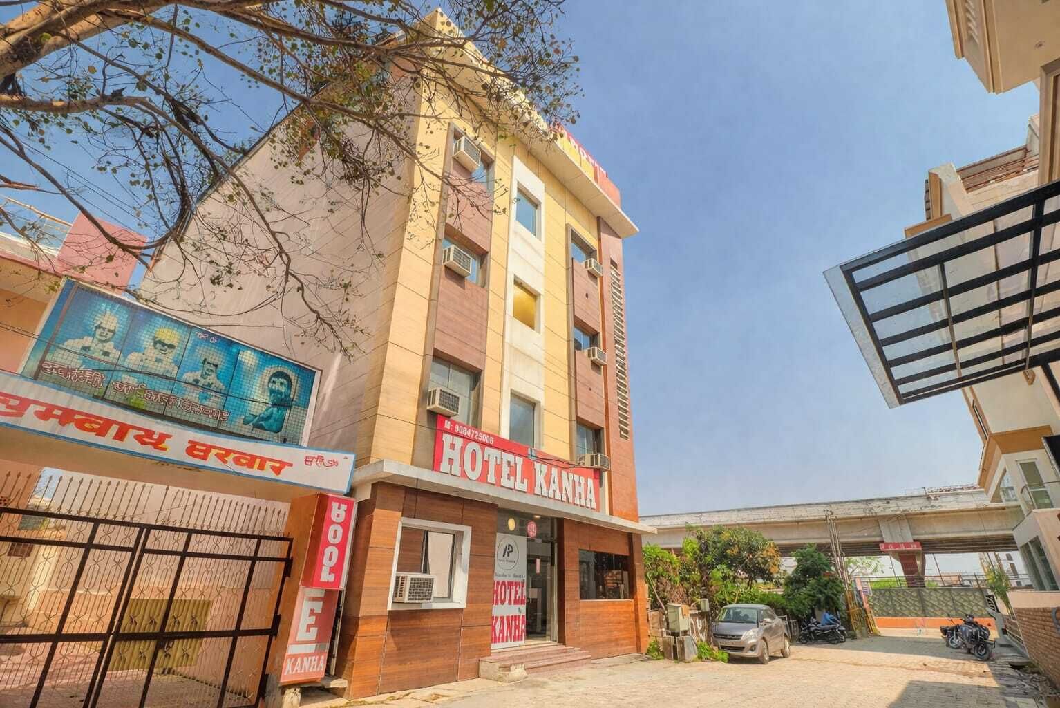 A multi-story hotel building with a prominent sign reading 'HOTEL KANHA'.