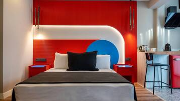 Chambre Deluxe, coin cuisine, en angle | 1 chambre, literie de qualité supérieure, minibar