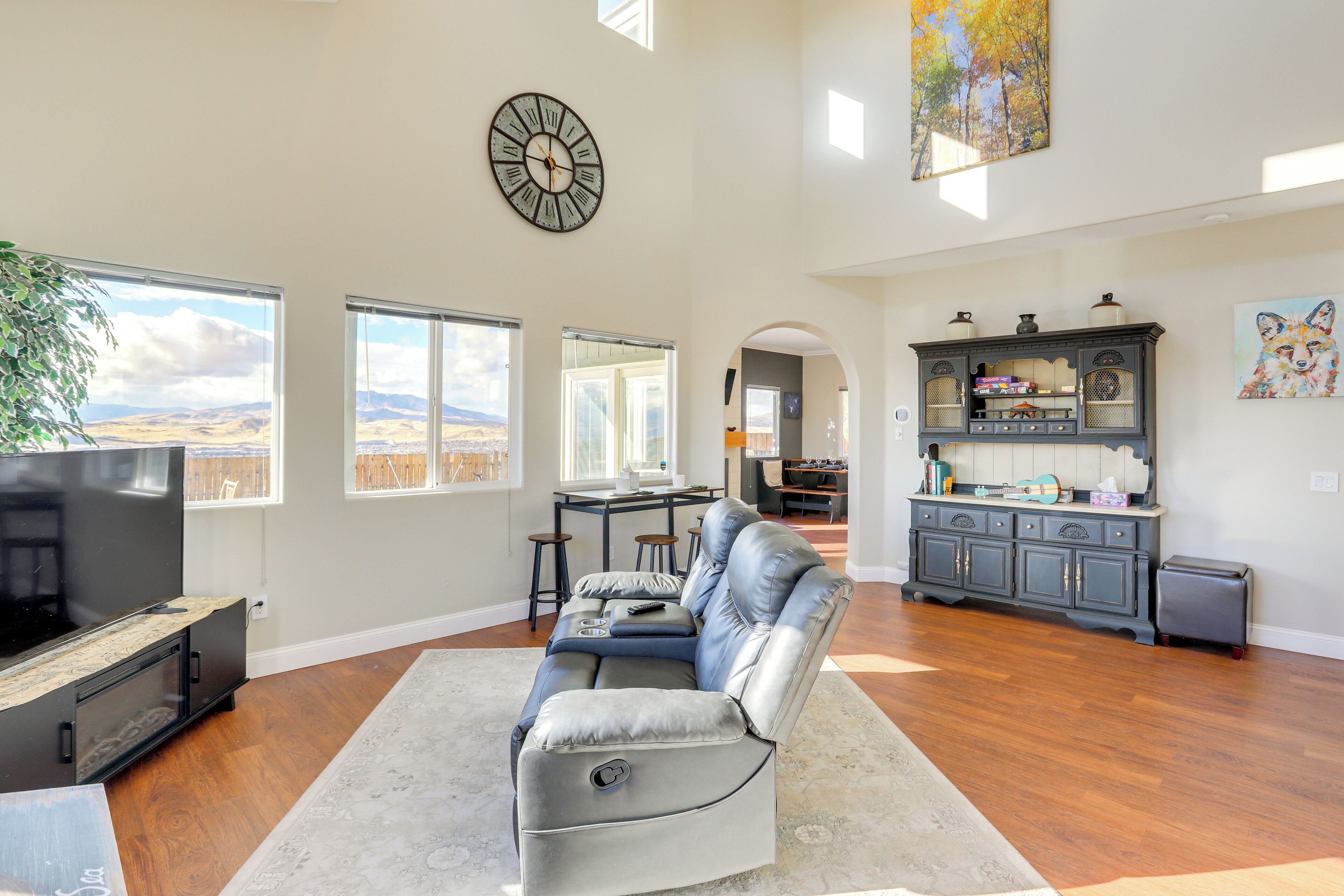 TV, fireplace, books