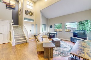 TV, fireplace, books