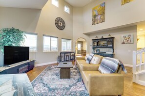 TV, fireplace, books