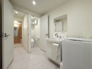 Deluxe-lejlighed | Badeværelse | Hjemmesko