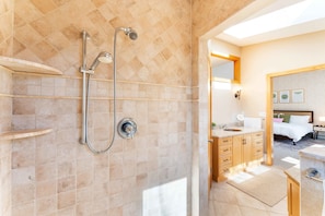 Shower, hair dryer, towels, shampoo