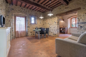 Classic Apartment | Living area | 32-inch flat-screen TV with cable channels - Le Fonti Apartments With Ac Near Siena (Poggibonsi)